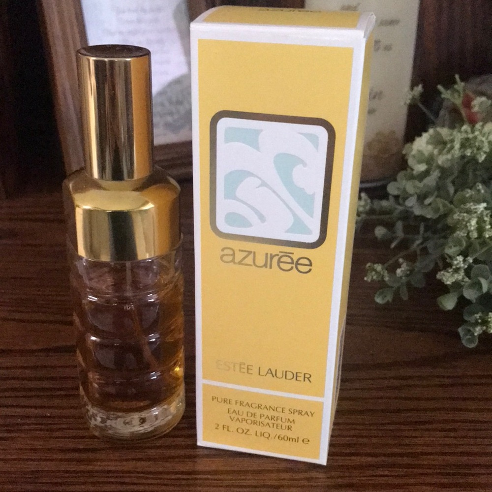 Ester Lauder AZUREE 2FL. OZ bottle with approx 2/3 remaining. Box not included